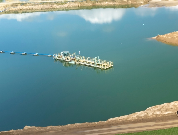 construction equipment in the middle of the lake