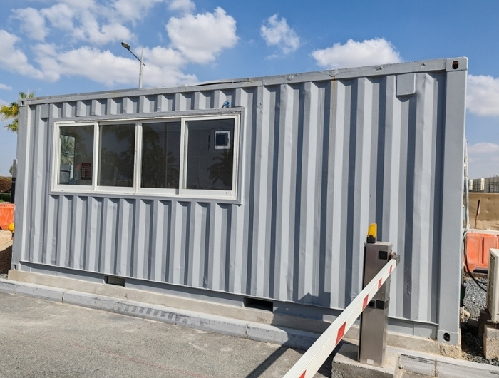 gray container remodeled to be a man camp