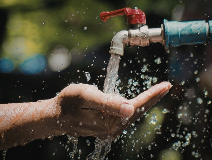 washing hands outside
