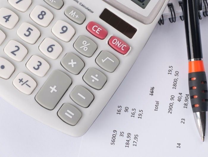 calculator pen and numbers