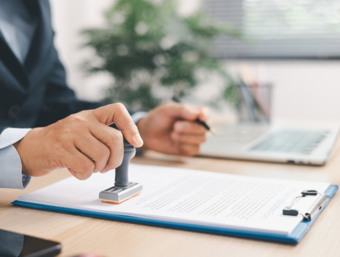 inspector stamping approval on permits