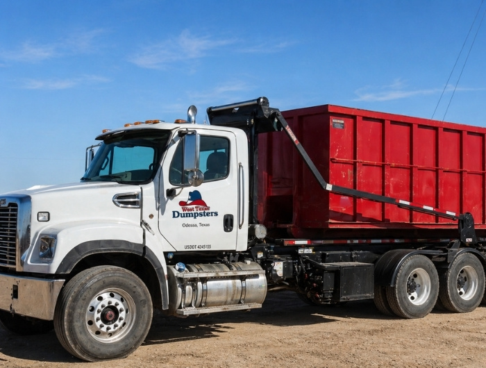 west texas dumpster truck in the field